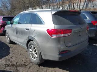 2016 Kia Sorento LX with VIN 5XYPGDA39GG061748, listed as a IAAI auction lot 41720011 with 124,084 mi miles. Bid and sale history available at carsss.com. Image 3.