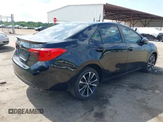 2019 Toyota Corolla L with VIN 5YFBURHE1KP923291, listed as a IAAI auction lot 42173538 with 60,184 mi miles and . Bid and sale history available at DreamBid. Image 4.