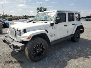 2021 Jeep Wrangler Unlimited Sahara z VIN 1C4JJXP65MW766023, wystawiony jako Copart lot #52332735 z przebiegiem 23 130 mil mil oraz Nie do naprawy • Non repairable. Historia ofert i sprzedaży dostępna na DreamBid. Obrazek 1.