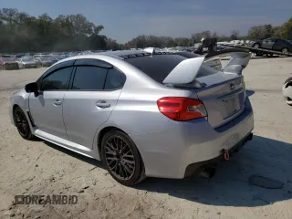 2015 Subaru WRX STI z VIN JF1VA2L67F9804241, wystawiony jako Copart lot #42649583 z przebiegiem 94 386 mil mil oraz . Historia ofert i sprzedaży dostępna na DreamBid. Obrazek 2.