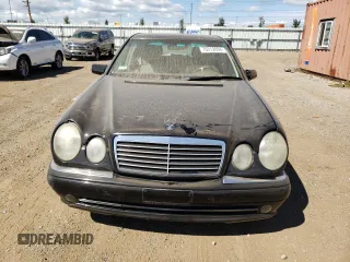 1999 Mercedes-Benz E-Class with VIN WDBJF70H6XA758770, listed as a Copart auction lot 70312094 with 0 mi miles and Salvage Title. Bid and sale history available at carsss.com. Image 5.