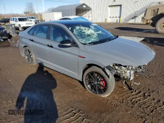 2024 Volkswagen Jetta 40th Anniversary Edition with VIN 3VW9T7BU7RM004058, listed as a Copart auction lot 79098874 with 23,451 mi miles and Salvage title. Bid and sale history available at DreamBid. Image 4.