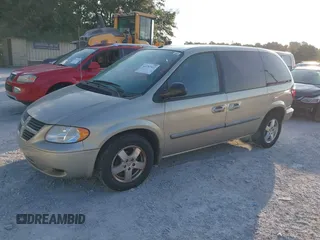 2007 Dodge Caravan SXT with VIN 1D4GP45R47B182876, listed as a IAAI auction lot 42792322 with 80,207 mi miles and . Bid and sale history available at DreamBid. Image 2.