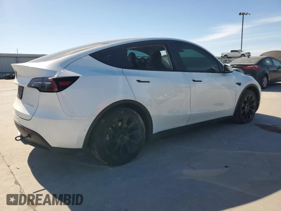 2022 Tesla Model Y Long Range with VIN 7SAYGAEE6NF506405, listed as a Copart auction lot 50392655 with 36,866 mi miles and Salvage Title. Bid and sale history available at DreamBid. Image 3.