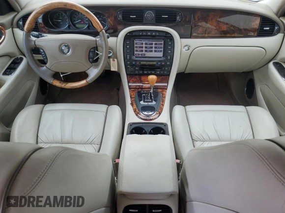 2004 Jaguar XJ with VIN SAJEA74C64SG08121, listed as a Copart auction lot 81736984 with 100,144 mi miles and Non Repairable. Bid and sale history available at DreamBid. Image 8.