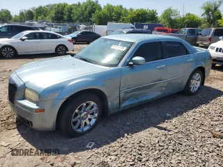 2009 Chrysler 300 Touring with VIN 2C3LA53V59H529553, listed as a Copart auction lot 61954205 with 102,281 mi miles and Salvage title. Bid and sale history available at DreamBid. Image 1.