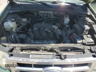 2008 Ford Escape XLT with VIN 1FMCU03158KC24575, listed as a Copart auction lot 57133855 with 200,329 mi miles and Salvage title. Bid and sale history available at DreamBid. Image 12.