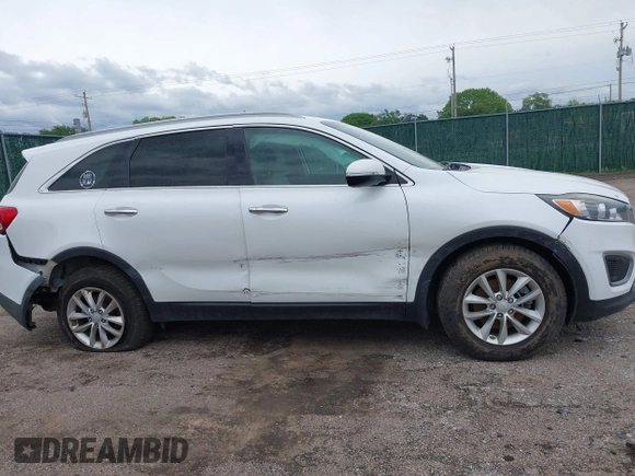 2016 Kia Sorento LX with VIN 5XYPG4A36GG035639, listed as a IAAI auction lot 42140364 with 142,711 mi miles. Bid and sale history available at carsss.com. Image 14.
