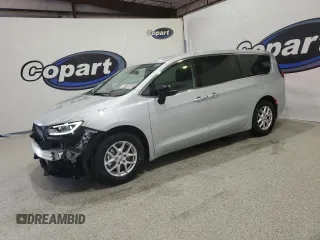 2024 Chrysler Pacifica Touring L with VIN 2C4RC1BGXRR147024, listed as a Copart auction lot 64748565 with 23,521 mi miles and Clean title. Bid and sale history available at DreamBid. Image 1.