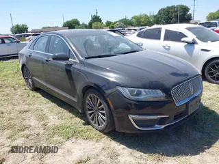 2018 Lincoln MKZ Premiere z VIN 3LN6L5A99JR623089, wystawiony jako IAAI lot #41981174 z przebiegiem 66 984 mil mil oraz . Historia ofert i sprzedaży dostępna na DreamBid. Obrazek 1.