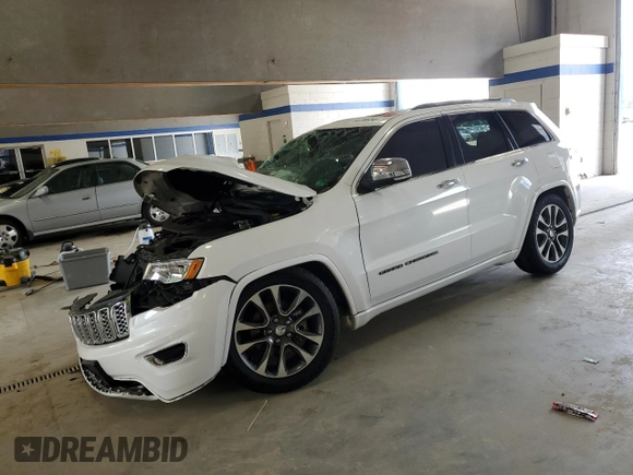 2017 Jeep Grand Cherokee Overland with VIN 1C4RJFCG1HC842890, listed as a Copart auction lot 63395045 with Not provided miles and Salvage title. Bid and sale history available at DreamBid. Image 1.