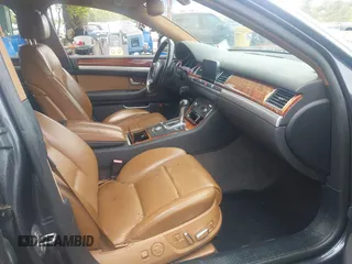 2009 Audi A8 4.2L z VIN WAUMV94E19N000406, wystawiony jako IAAI lot #42264086 z przebiegiem 145 992 mil mil oraz . Historia ofert i sprzedaży dostępna na DreamBid. Obrazek 5.