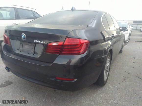 2015 BMW 5 Series 528i with VIN WBA5A5C55FD519258, listed as a IAAI auction lot 41951862 with 123,822 mi miles. Bid and sale history available at carsss.com. Image 4.