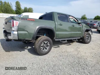 2022 Toyota Tacoma SR with VIN 3TMCZ5AN9NM487732, listed as a Copart auction lot 60749845 with Not provided miles and Salvage title. Bid and sale history available at DreamBid. Image 3.