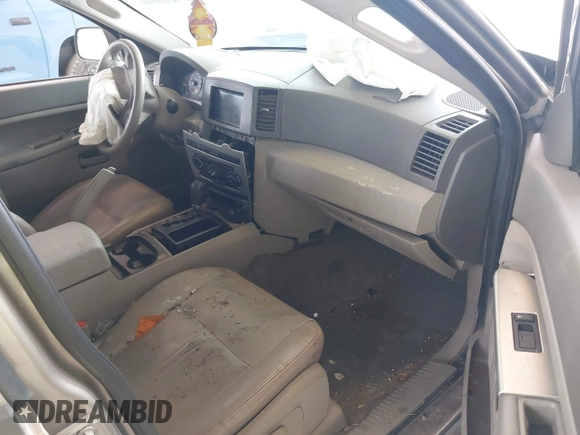 2005 Jeep Grand Cherokee Laredo with VIN 1J4GR48KX5C589625, listed as a IAAI auction lot 42699102 with Not provided miles and . Bid and sale history available at DreamBid. Image 5.