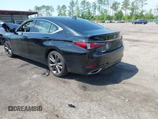 2021 Lexus ES with VIN 58AGZ1B10MU086770, listed as a IAAI auction lot 42022988 with 57,958 mi miles. Bid and sale history available at carsss.com. Image 3.
