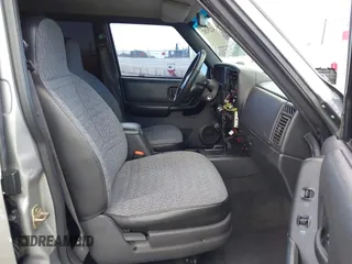2000 Jeep Cherokee z VIN 1J4FF48S1YL200458, wystawiony jako IAAI lot #42239282 z przebiegiem Nie podano mil oraz . Historia ofert i sprzedaży dostępna na DreamBid. Obrazek 5.