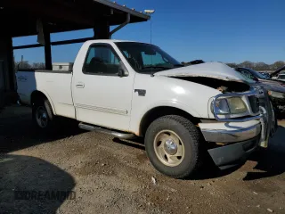 2000 Ford F-150 XL with VIN 1FTRF18W0YNB59622, listed as a Copart auction lot 50178485 with 264,057 mi miles and Salvage title. Bid and sale history available at DreamBid. Image 4.
