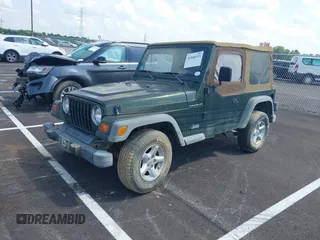 1998 Jeep Wrangler SE with VIN 1J4FY29P8WP793427, listed as a IAAI auction lot 42546515 with 145,388 mi miles and . Bid and sale history available at DreamBid. Image 2.