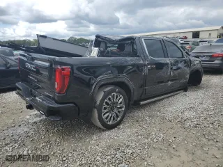 2023 GMC Sierra 1500 Denali Ultimate with VIN 1GTUUHEL9PZ273709, listed as a Copart auction lot 72153024 with 24,143 mi miles and Salvage Title. Bid and sale history available at carsss.com. Image 3.