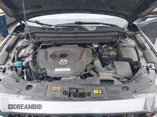 2022 Mazda CX-5 2.5 Turbo with VIN JM3KFBAY8N0647204, listed as a IAAI auction lot 41567490 with 40,396 mi miles and . Bid and sale history available at carsss.com. Image 10.
