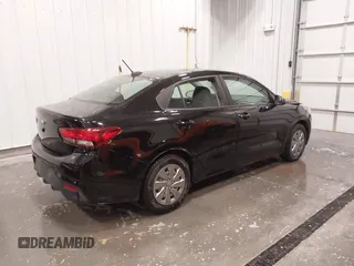 2020 Kia Rio LX with VIN 3KPA24AD1LE308880, listed as a IAAI auction lot 41827075 with 52,070 mi miles. Bid and sale history available at carsss.com. Image 4.