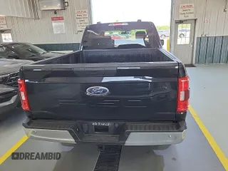 2021 Ford F-150 XL with VIN 1FTFW1E52MFB64744, listed as a IAAI auction lot 42733866 with 98,411 mi miles and . Bid and sale history available at DreamBid. Image 1.