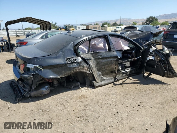 2016 BMW 5 Series 550i xDrive with VIN WBAKP9C55GD980454, listed as a Copart auction lot 59319485 with 91,424 mi miles and Salvage title. Bid and sale history available at DreamBid. Image 3.