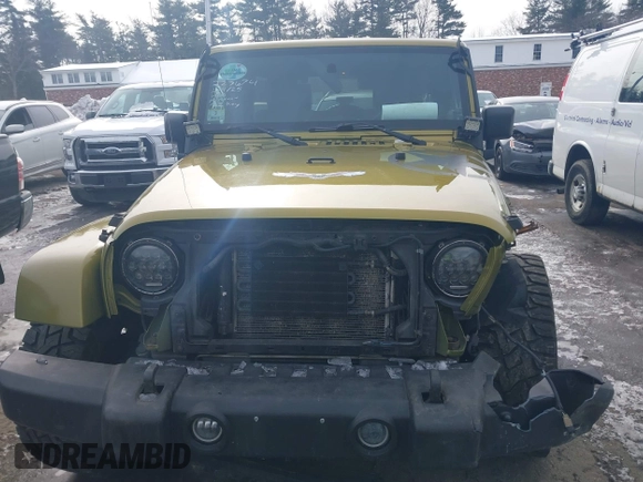 2007 Jeep Wrangler Unlimited Sahara z VIN 1J4GA59137L147257, wystawiony jako IAAI lot #41565673 z przebiegiem 187 982 mil mil oraz . Historia ofert i sprzedaży dostępna na DreamBid. Obrazek 17.
