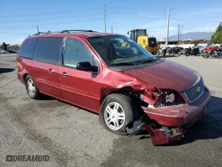 2005 Ford Freestar Wagon SEL with VIN 2FMZA52265BA82186, listed as a Copart auction lot 86738964 with 156,475 mi miles and Salvage Title. Bid and sale history available at carsss.com. Image 4.