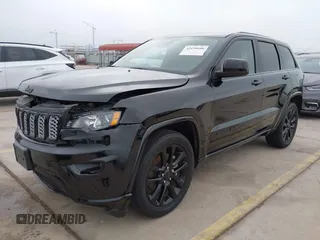 2021 Jeep Grand Cherokee Laredo X with VIN 1C4RJEAG8MC714539, listed as a IAAI auction lot 42190686 with 59,359 mi miles and . Bid and sale history available at DreamBid. Image 18.