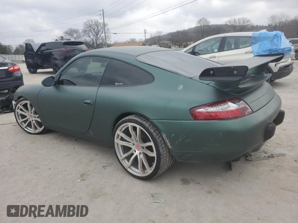 1999 Porsche 911 z VIN WP0AA299XXS623462, wystawiony jako Copart lot #85549554 z przebiegiem Nie podano mil oraz Szkoda całkowita • Salvage title. Historia ofert i sprzedaży dostępna na DreamBid. Obrazek 2.