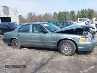 2005 Ford Crown Victoria Standard с VIN 2FAFP73W25X121741, выставлен на аукционе IAAI как лот 42059966 с пробегом 99 667 миль миль и . История ставок и продаж доступна на DreamBid. Изображение 13.