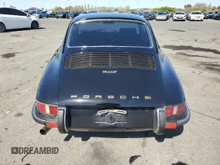 1971 Porsche 911 with VIN 9111120590, listed as a Copart auction lot 52559665 with 44,582 mi miles and Salvage title. Bid and sale history available at DreamBid. Image 6.
