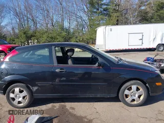 2007 Ford Focus S with VIN 1FAHP31N67W294415, listed as a IAAI auction lot 41783050 with 143,876 mi miles and . Bid and sale history available at DreamBid. Image 6.
