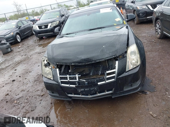 2013 Cadillac CTS Luxury z VIN 1G6DG5E52D0111849, wystawiony jako IAAI lot #42130235 z przebiegiem 129 993 mil mil oraz . Historia ofert i sprzedaży dostępna na DreamBid. Obrazek 12.