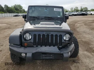 2013 Jeep Wrangler Unlimited Sahara with VIN 1C4BJWEG8DL584909, listed as a Copart auction lot 58520555 with 91,633 mi miles and Salvage title. Bid and sale history available at DreamBid. Image 5.