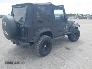 1997 Jeep Wrangler Sport with VIN 1J4FY19S2VP481780, listed as a IAAI auction lot 41822213 with 156,629 mi miles. Bid and sale history available at carsss.com. Image 4.