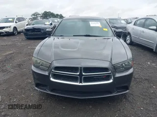 2013 Dodge Charger SE z VIN 2C3CDXBG8DH629628, wystawiony jako IAAI lot #42199220 z przebiegiem 153 556 mil mil oraz . Historia ofert i sprzedaży dostępna na DreamBid. Obrazek 12.