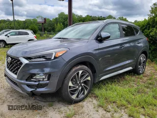 2021 Hyundai Tucson SEL z VIN KM8J33ALXMU396311, wystawiony jako IAAI lot #42448255 z przebiegiem 15 407 mil mil oraz . Historia ofert i sprzedaży dostępna na DreamBid. Obrazek 1.