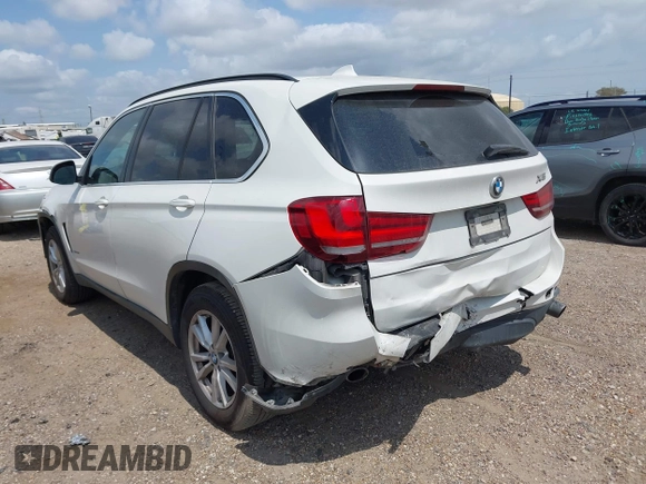 2015 BMW X5 xDrive35i z VIN 5UXKR0C57F0K62448, wystawiony jako IAAI lot #42321842 z przebiegiem 198 839 mil mil oraz . Historia ofert i sprzedaży dostępna na DreamBid. Obrazek 3.