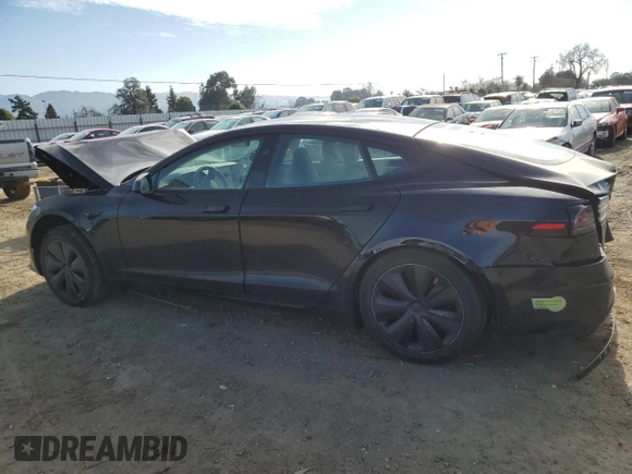 2023 Tesla Model S with VIN 5YJSA1E57PF507456, listed as a Copart auction lot 44649945 with 8,760 mi miles and Salvage title. Bid and sale history available at DreamBid. Image 2.