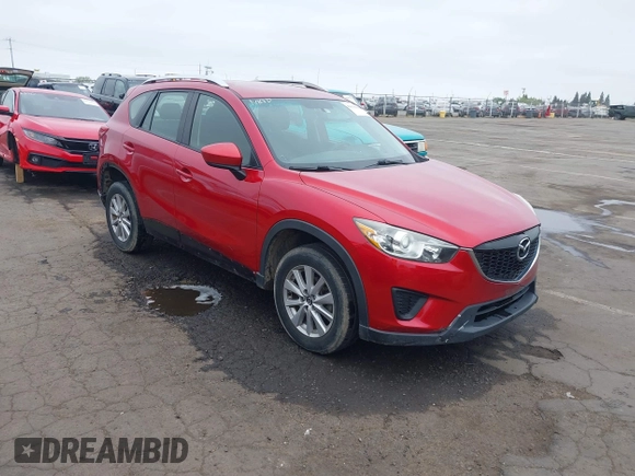 2015 Mazda CX-5 Sport z VIN JM3KE2BE9F0452625, wystawiony jako IAAI lot #42114867 z przebiegiem 167 849 mil mil oraz . Historia ofert i sprzedaży dostępna na DreamBid. Obrazek 1.