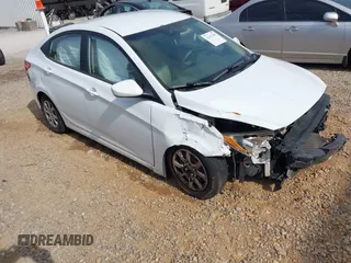 2014 Hyundai Accent GLS z VIN KMHCT4AE5EU697201, wystawiony jako IAAI lot #42157098 z przebiegiem 139 181 mil mil oraz . Historia ofert i sprzedaży dostępna na DreamBid. Obrazek 1.