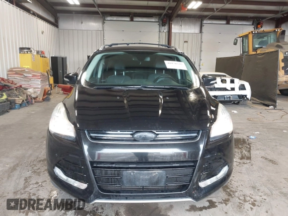 2015 Ford Escape Titanium with VIN 1FMCU9J98FUC70495, listed as a IAAI auction lot 41978543 with 129,974 mi miles. Bid and sale history available at carsss.com. Image 12.