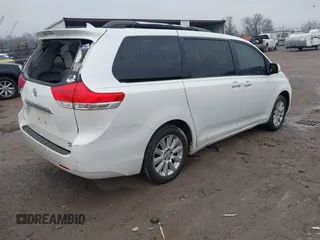 2011 Toyota Sienna XLE with VIN 5TDDK3DC8BS010051, listed as a IAAI auction lot 41405424 with 293,348 mi miles. Bid and sale history available at carsss.com. Image 4.