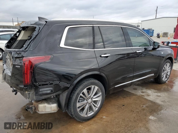 2021 Cadillac XT6 Premium Luxury z VIN 1GYKPCRS6MZ207546, wystawiony jako Copart lot #85995814 z przebiegiem 30 885 mil mil oraz Czysty tytuł • Clean title. Historia ofert i sprzedaży dostępna na DreamBid. Obrazek 3.