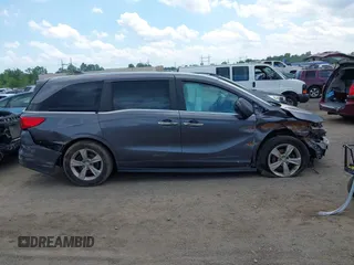 2020 Honda Odyssey EX with VIN 5FNRL6H54LB025555, listed as a IAAI auction lot 42512480 with 95,425 mi miles and . Bid and sale history available at DreamBid. Image 13.