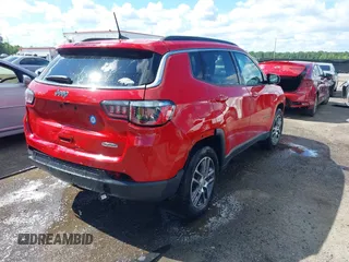 2020 Jeep Compass Latitude with VIN 3C4NJCBB2LT205894, listed as a IAAI auction lot 42284889 with 85,588 mi miles and . Bid and sale history available at DreamBid. Image 4.
