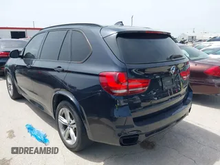 2014 BMW X5 xDrive50i with VIN 5UXKR6C55E0C03743, listed as a IAAI auction lot 42268302 with 118,892 mi miles and . Bid and sale history available at DreamBid. Image 3.